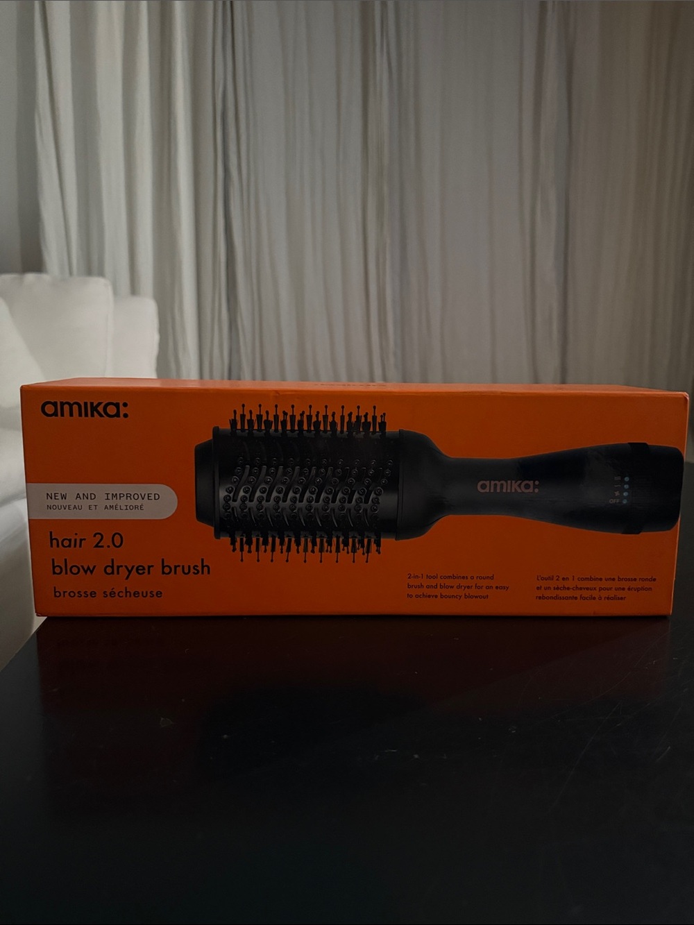 amika hair 2.0 Blow Dryer Brush — Orange & Black Packaging